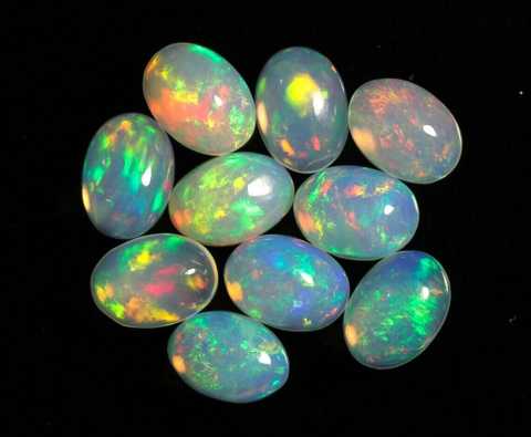 https://nvovkjewelry.com.ua/content/images/22/480x395l50nn0/opal-oval-10kh8-mm-kaboshon-tsina-za-sht-93135635765609.jpg